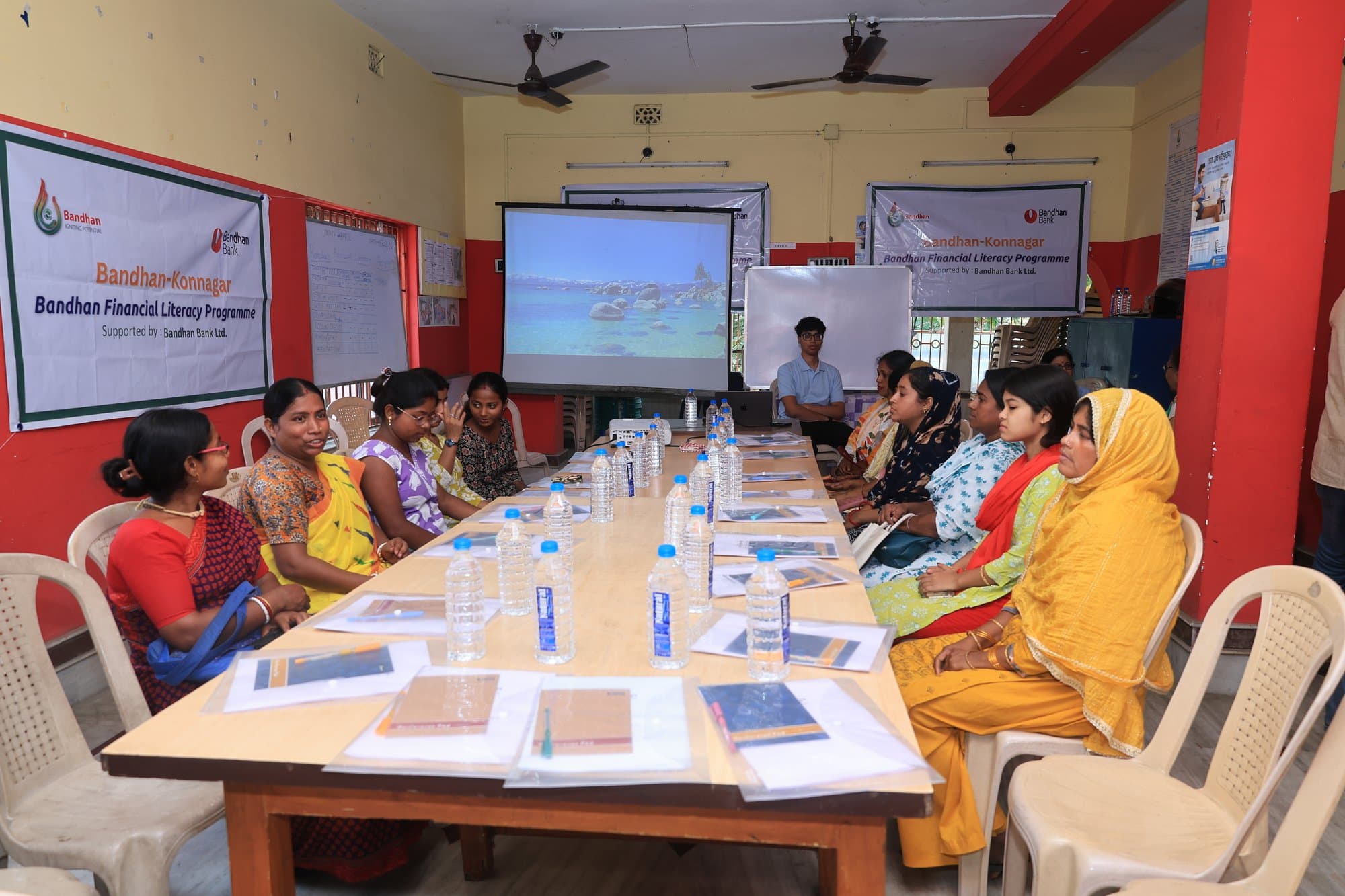 The cohort gathered at a workshop hall