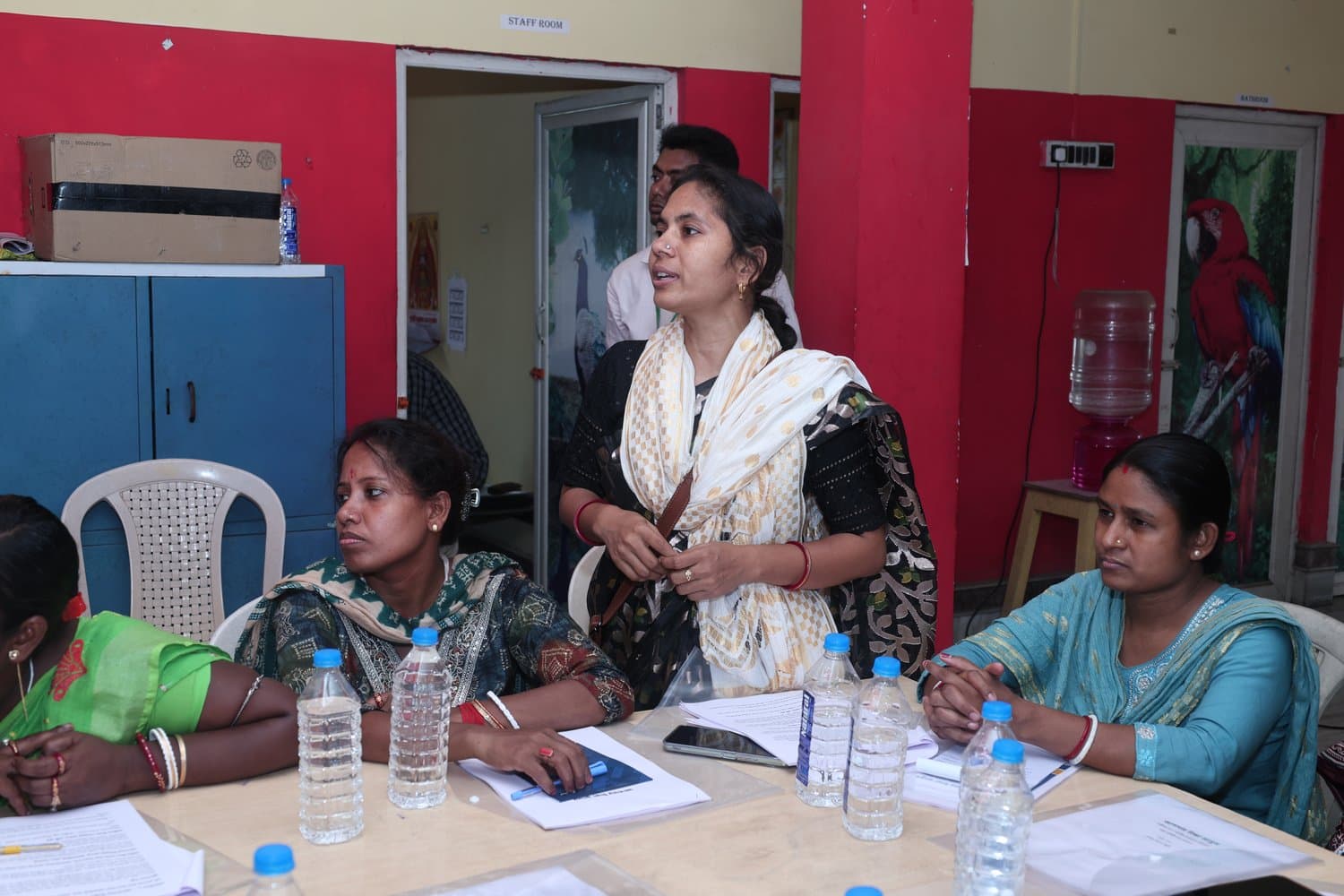 A Community Resource Person speaking during a session