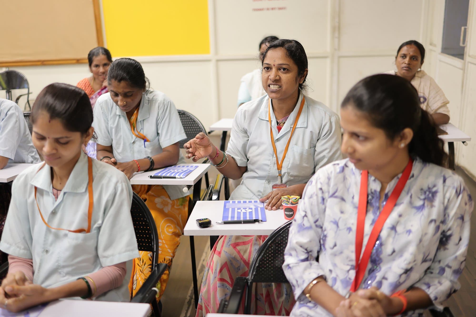Participants working through the worksheet at their desks