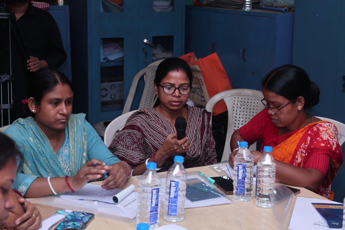 Participants taking notes during a session